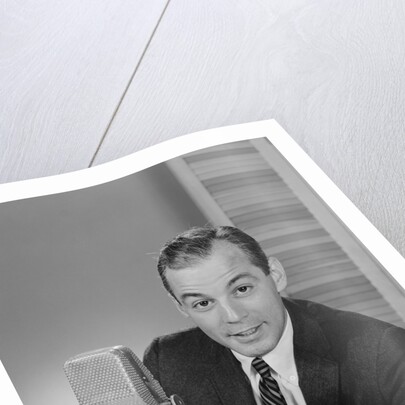 Man speaking into microphone radio tv announcer broadcaster by Anonymous