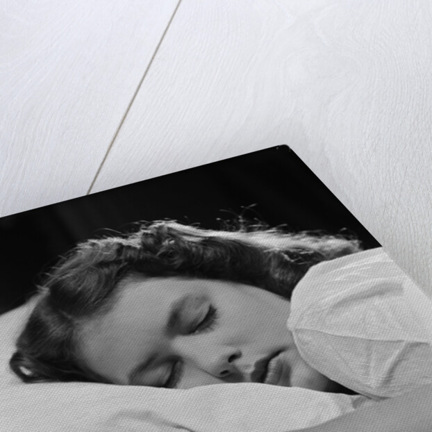 Girl sleeping head on pillow by Anonymous