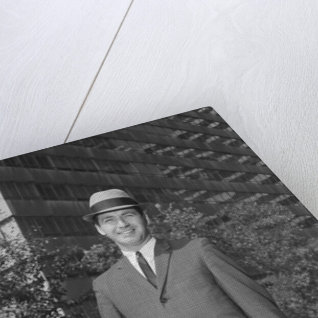 Portrait businessman wearing hat suit holding briefcase by Anonymous