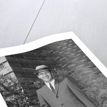Portrait businessman wearing hat suit holding briefcase by Anonymous