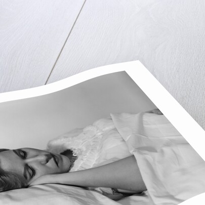 Woman sleeping bed by Anonymous