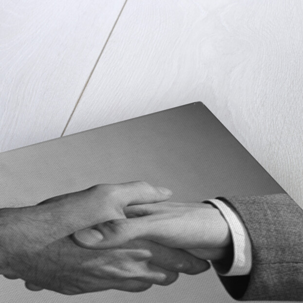 Male handshake close-up of hands by Anonymous