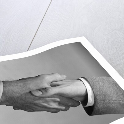 Male handshake close-up of hands by Anonymous