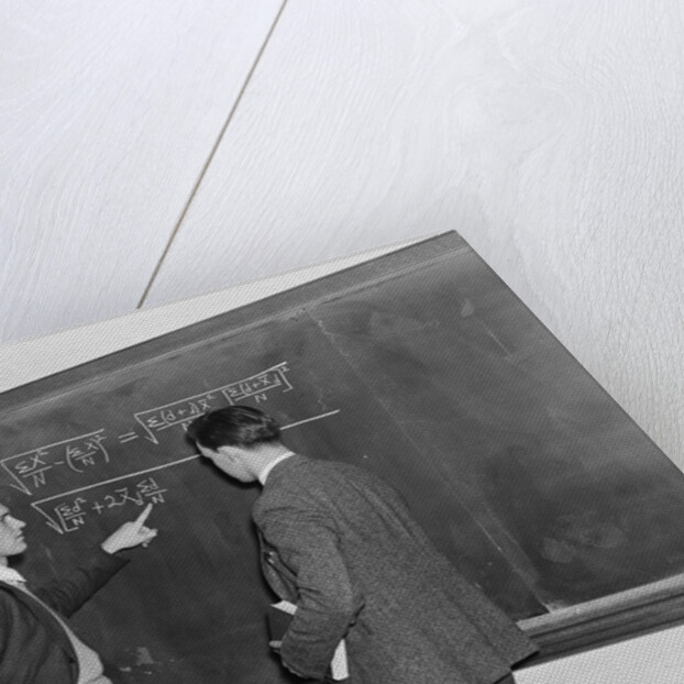 2 students professors mathematicians blackboard studying complex equations by Anonymous