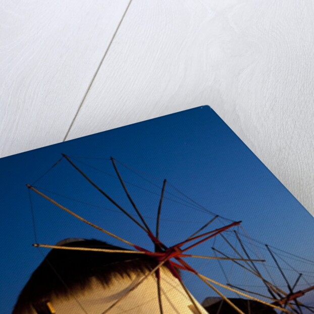 Windmills lite up at dusk, Greek Island of Mykonos by Anonymous