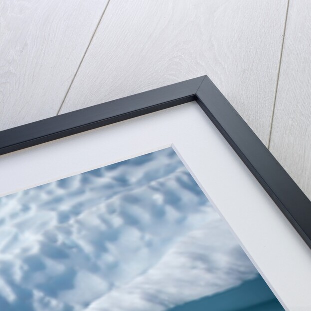 Iceberg above and below water in Disko Bay in Greenland by Anonymous