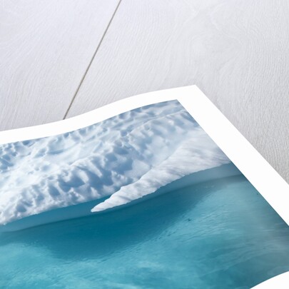 Iceberg above and below water in Disko Bay in Greenland by Anonymous