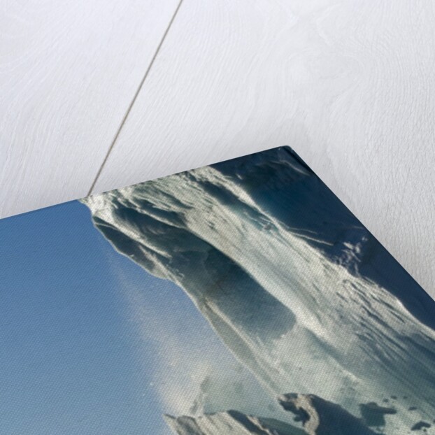 Calving iceberg in Disko Bay in Greenland by Anonymous