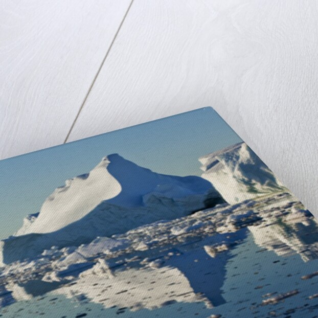 Iceberg and bergy bits in Disko Bay in Greenland by Anonymous