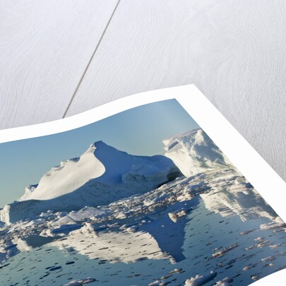 Iceberg and bergy bits in Disko Bay in Greenland by Anonymous