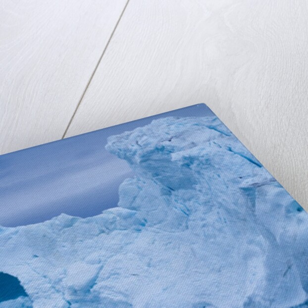 Hole melted in iceberg in Disko Bay in Greenland by Anonymous