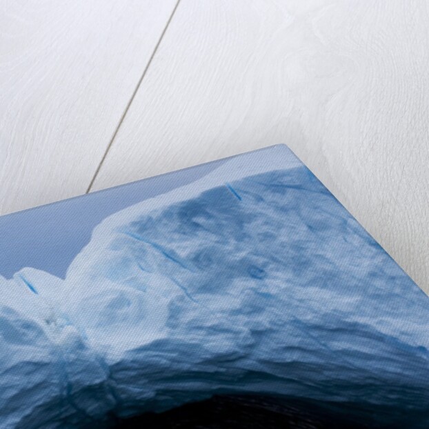 Arched iceberg in Disko Bay in Greenland by Anonymous