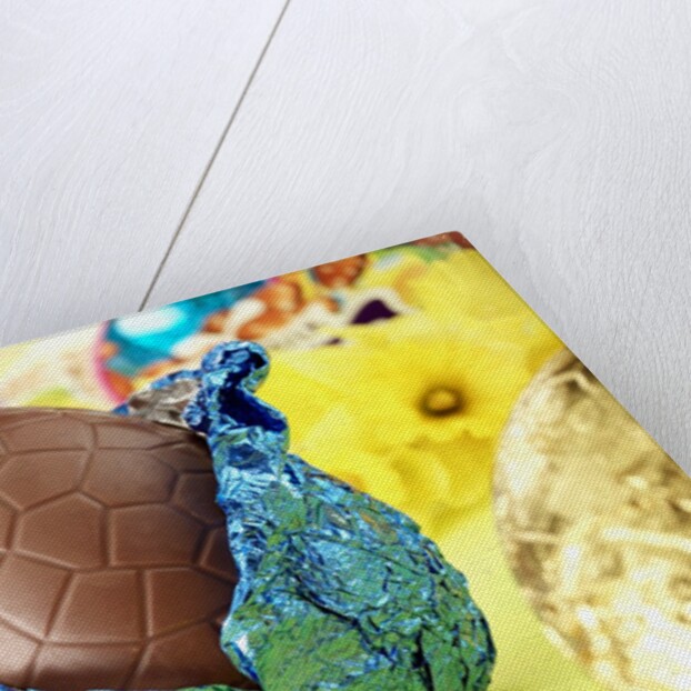 Chocolate Easter egg with opened foil by Anonymous