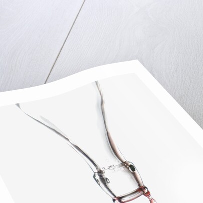 Liquid pouring out of empty bottle by Anonymous