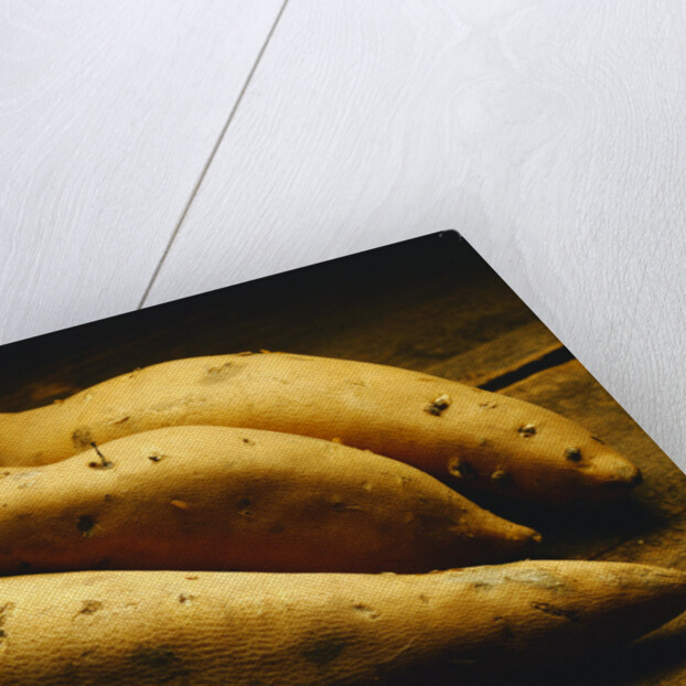 Yams on Wooden Table by Anonymous
