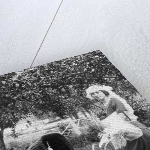 Mother to be with stroller at baby shower, ca. 1924 by Anonymous