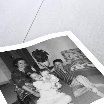 Mother with son and daughter in living room, ca. 1960 by Anonymous