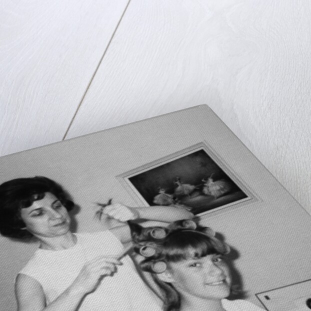 Mother helps 16 year old daughter get ready for date, ca. 1970 by Anonymous