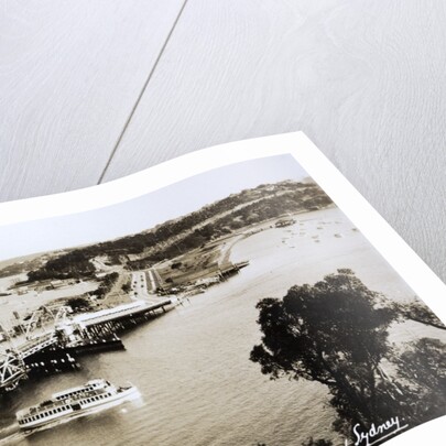 Sydney Spit Bridge, Middle Harbour, Sydney, New South Wales, Australia in 1924. The bridge shown is a wooden lifting bridge. On the road, there are cars of the period. by Anonymous