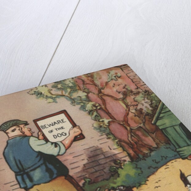 Man putting up "Beware of Dog" sign by Anonymous