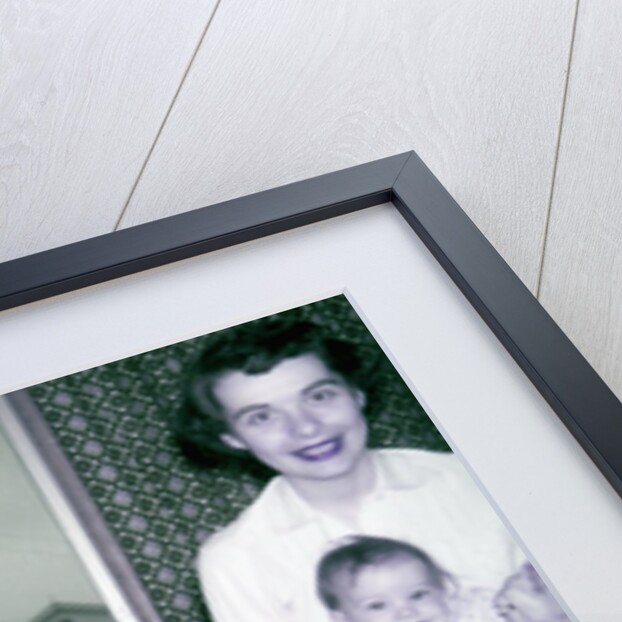Proud new mother with baby, ca. 1956. by Anonymous