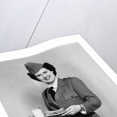 1940s army woman with lunch tray with a glass of milk and sandwich by Anonymous