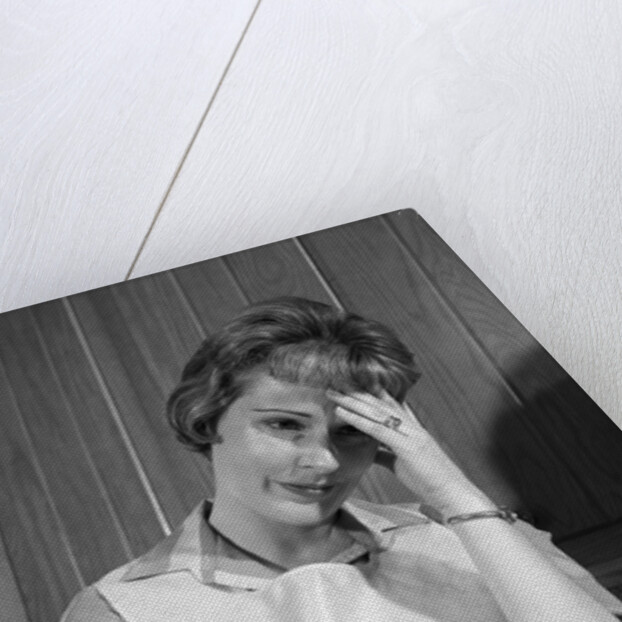 1960s housewife with headache by Anonymous