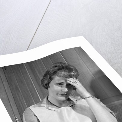 1960s housewife with headache by Anonymous