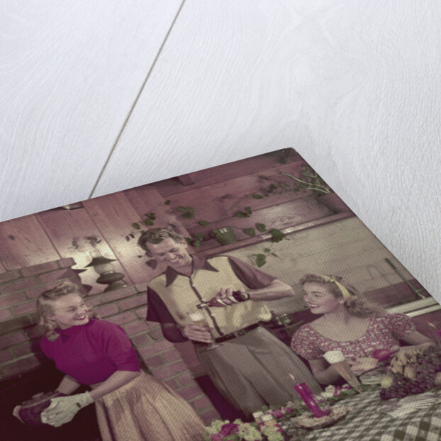 1950s 2 couples cooking picnic in rustic kitchen drinking beer by Anonymous