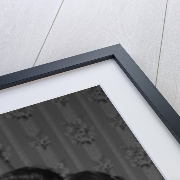1950s mother & daughter admiring baby in bassinet by Anonymous