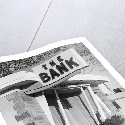 1960s window storefront of bank building by Anonymous