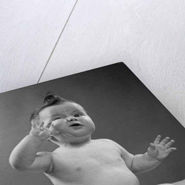 1950s full figure baby sitting gesture hand touching cheek face expression funny by Anonymous