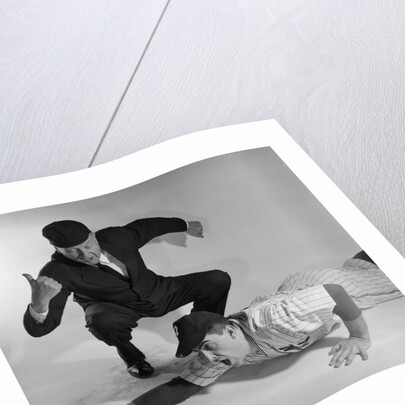 1950s baseball umpire calling sliding player out studio shot by Anonymous
