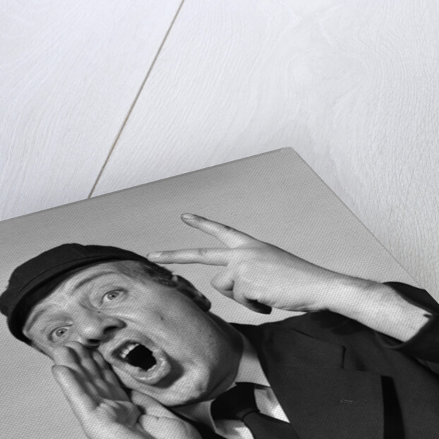 1950s baseball umpire calling a ball or a strike or an out looking at camera by Anonymous