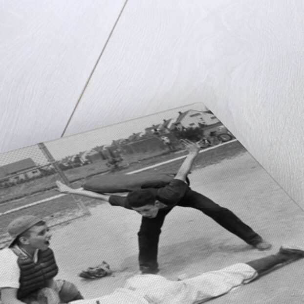 1950s little league umpire calling safe player sliding into home plate by Anonymous