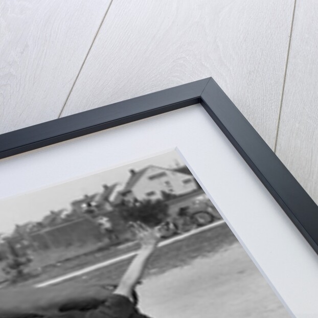 1950s little league umpire calling safe player sliding into home plate by Anonymous