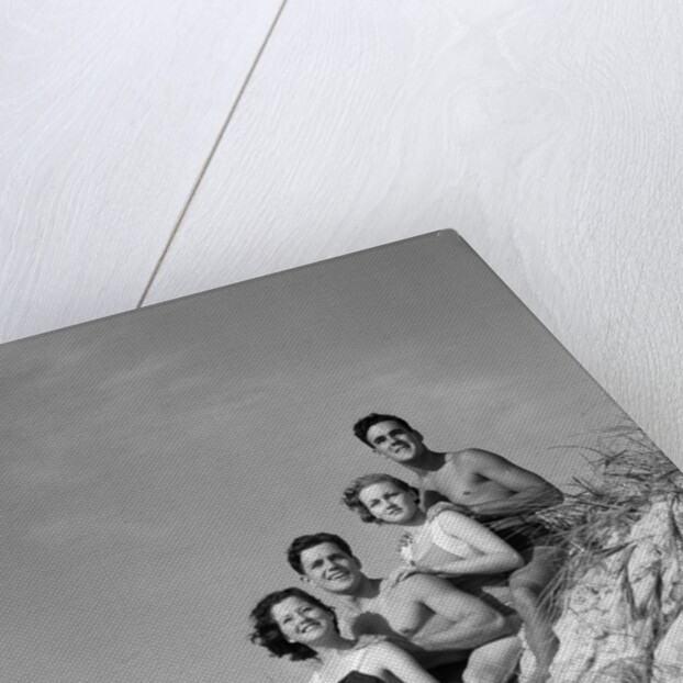 1930s group young men women posed on beach sand dune by Anonymous