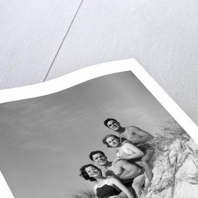 1930s group young men women posed on beach sand dune by Anonymous