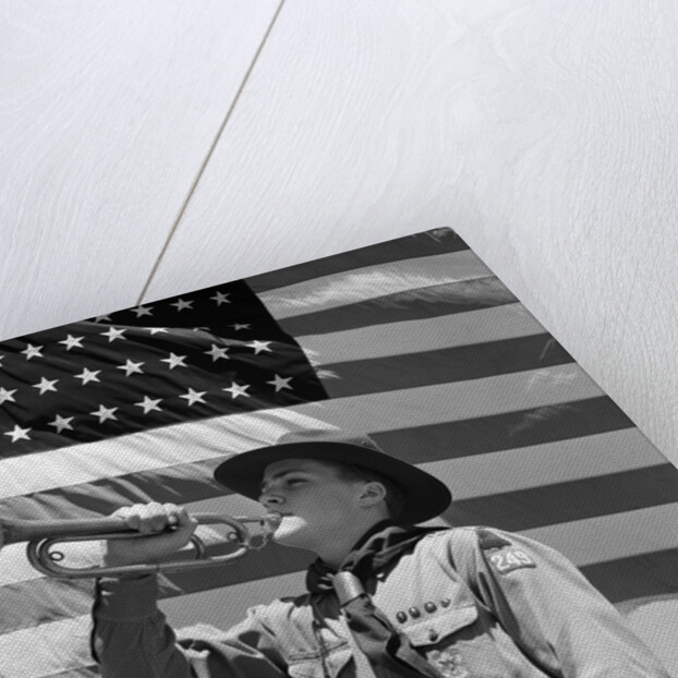 1940s boy scout playing bugle in front of 48 star american flag by Anonymous