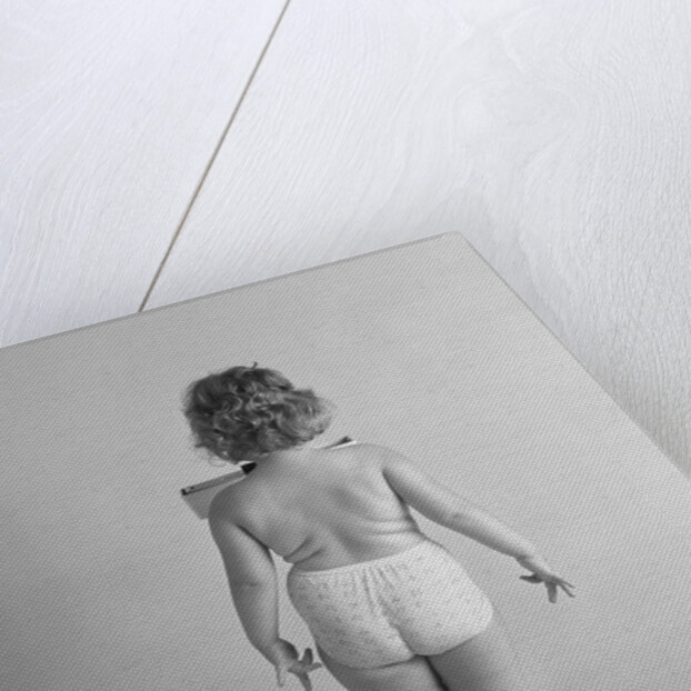 Back view of chubby girl wearing panties weighing herself by Anonymous