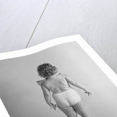 Back view of chubby girl wearing panties weighing herself by Anonymous