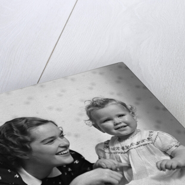 1930s smiling mother and happy child looking at camera by Anonymous