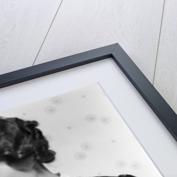 1930s woman mother giving baby daughter drink from mug by Anonymous