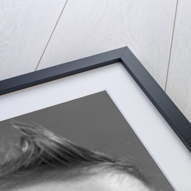 1950s baby making a funny face and bronx cheer noise looking at camera by Anonymous