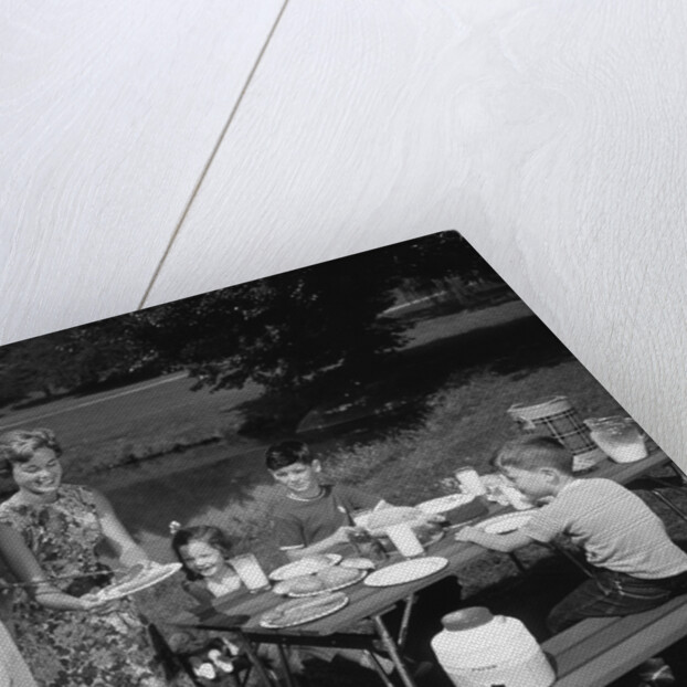 1950s family picnic bar-b-cue mom dad children by Anonymous