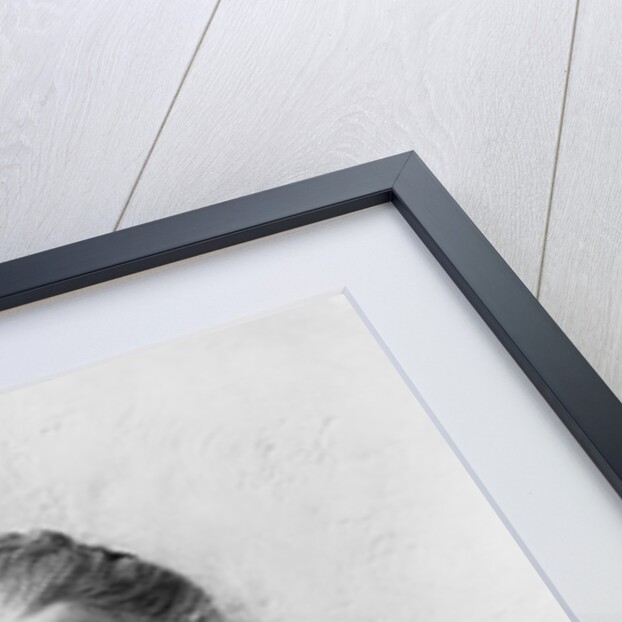 1930s 1940s elderly character woman smiling reading letter wearing apron looking at camera by Anonymous