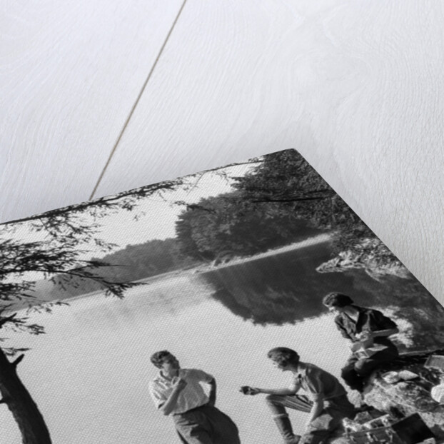 1920s 1930s 3 people picnicking by onata lake man wearing jodhpurs standing two seated women berkshires ma usa by Anonymous