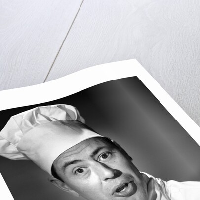 1950s portrait man chef humorous expression looking at camera by Anonymous