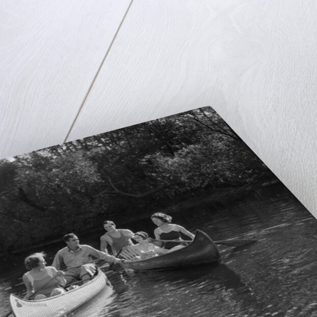 1930s summertime group of five young men & women in two canoes paddling down a stream by Anonymous