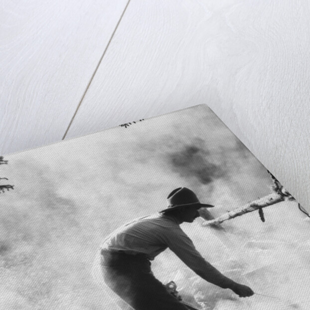 1920s 1930s man cowboy cook bending over campfire by Anonymous